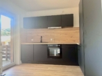 Bild - In Citynähe – Renovierte 4-Zimmerwohnung im Erdgeschoss zur Miete!