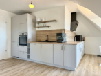 Bild - Neubau im Zentrum: 2-Zimmer-Dachgeschosswohnung mit Südwest Balkon!