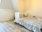 Bild - Neubau im Zentrum: 2-Zimmer-Dachgeschosswohnung mit Südwest Balkon!