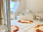 Bild - Ruhige Wohnlage in Werlte – Bungalow mit lichtdurchflutetem Wintergarten!