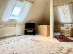 Bild - Ruhige Wohnlage in Werlte – Bungalow mit lichtdurchflutetem Wintergarten!
