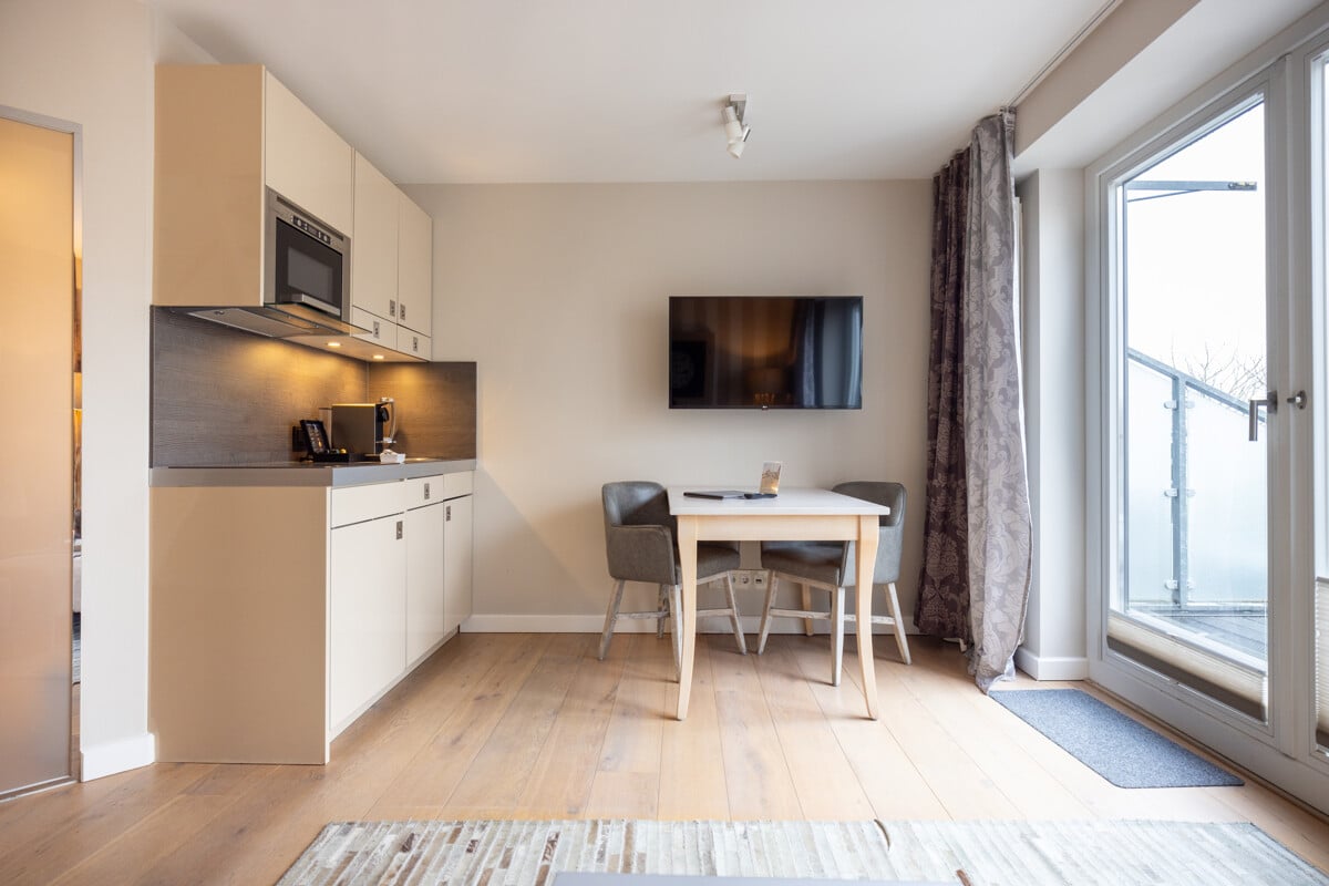 Bild - Nordsee im Blick, Rendite im Fokus – Exklusive Maisonette mit Nordseeblick in List auf Sylt!