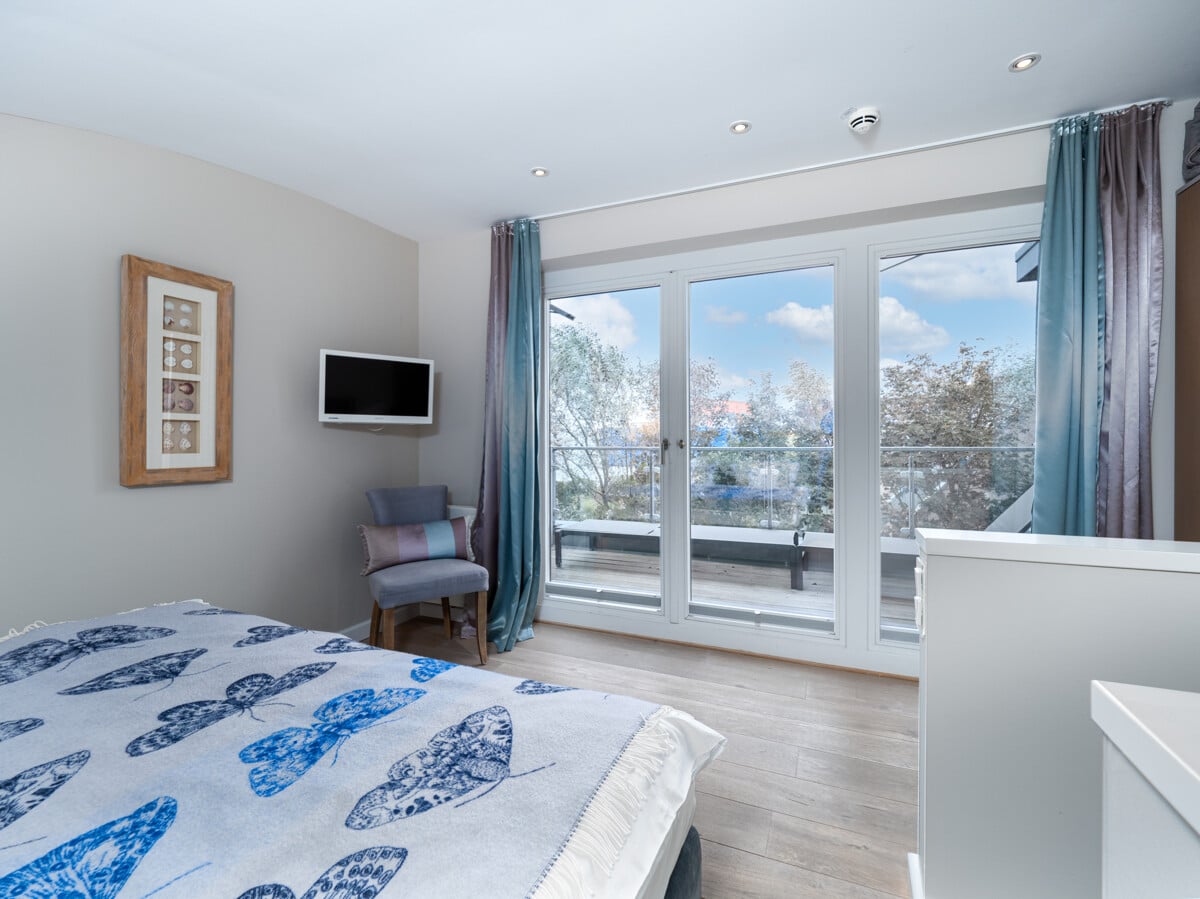 Bild - Nordsee im Blick, Rendite im Fokus – Exklusive Maisonette mit Nordseeblick in List auf Sylt!