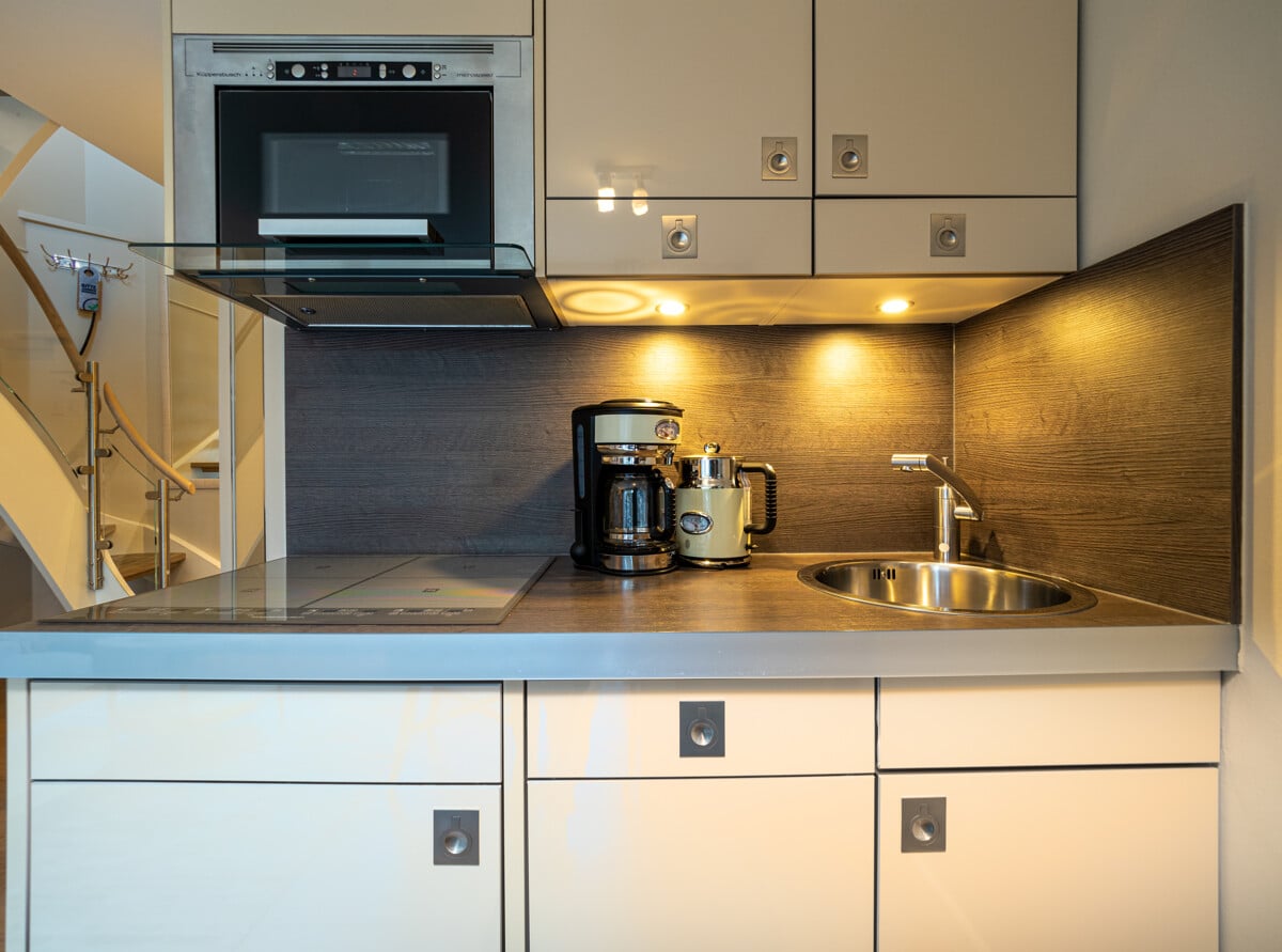 Bild - Nordsee im Blick, Rendite im Fokus – Exklusive Maisonette mit Nordseeblick in List auf Sylt!