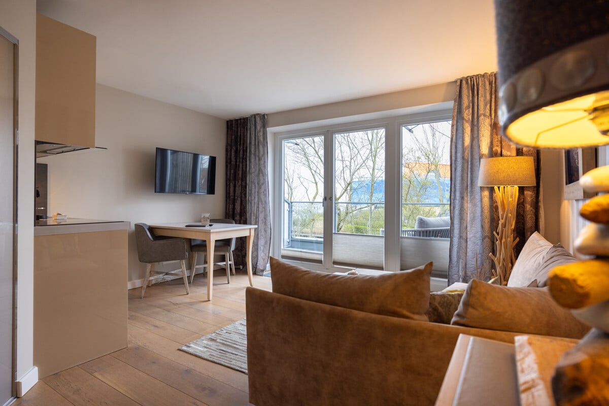 Bild - Nordsee im Blick, Rendite im Fokus – Exklusive Maisonette mit Nordseeblick in List auf Sylt!
