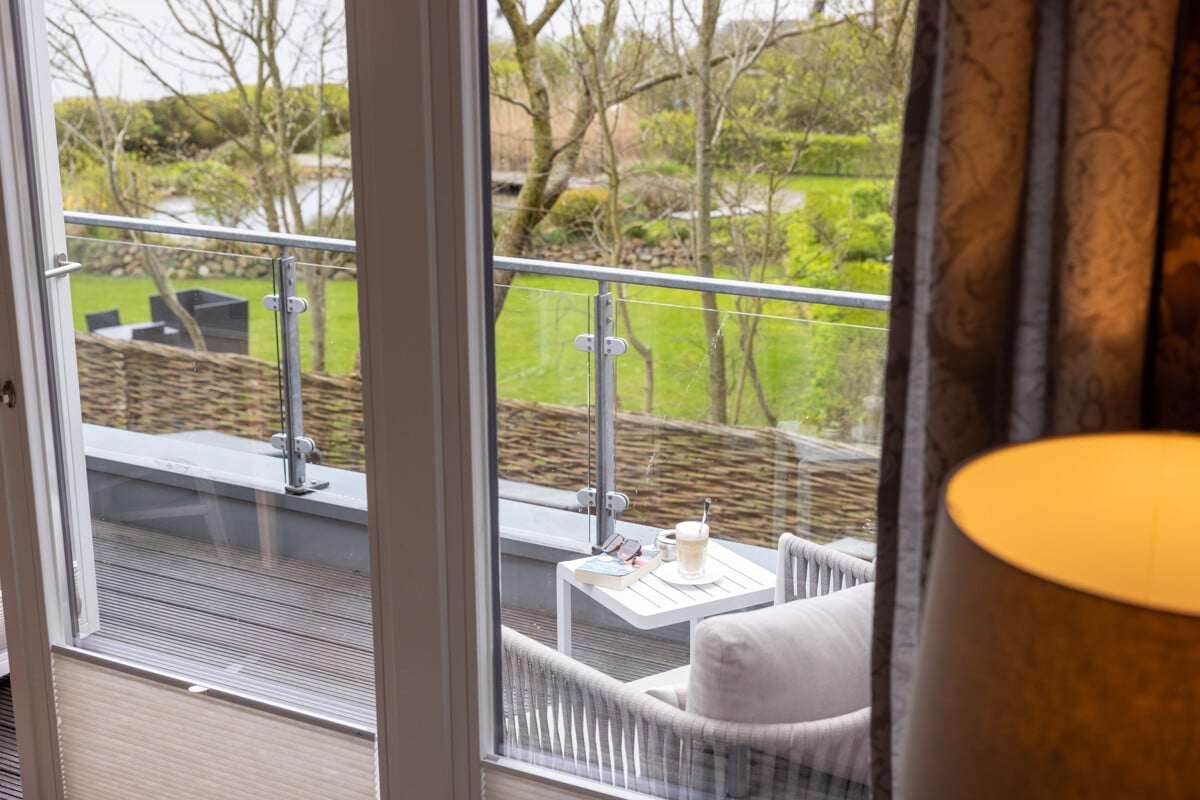 Bild - Nordsee im Blick, Rendite im Fokus – Exklusive Maisonette mit Nordseeblick in List auf Sylt!